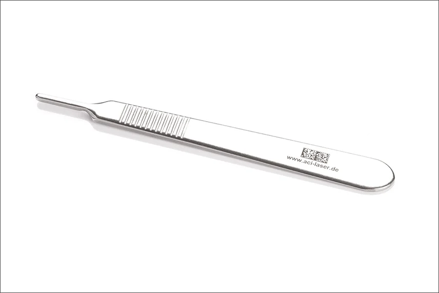 Black laser marking on stainless steel scalpel handle